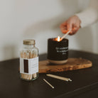 Safety matches styled with candle and home decor