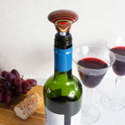 Multicolor wood wine bottle stopper close-up detail